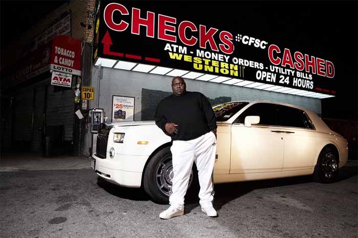 A picture of Faizon Love and his car.